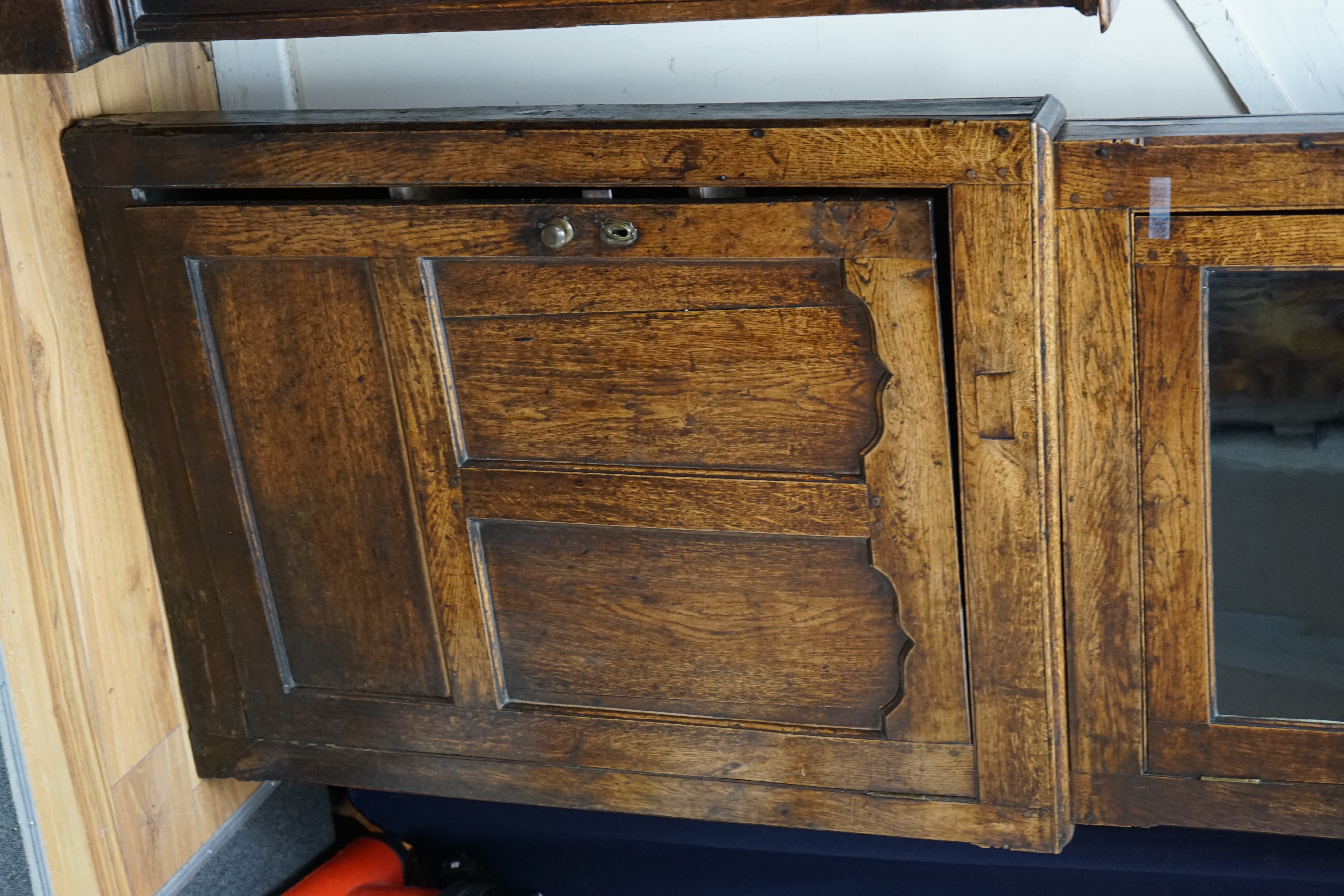 An 18th century two-sectional Provincial oak standing corner cupboard, width 80cm depth 30cm height 206cm